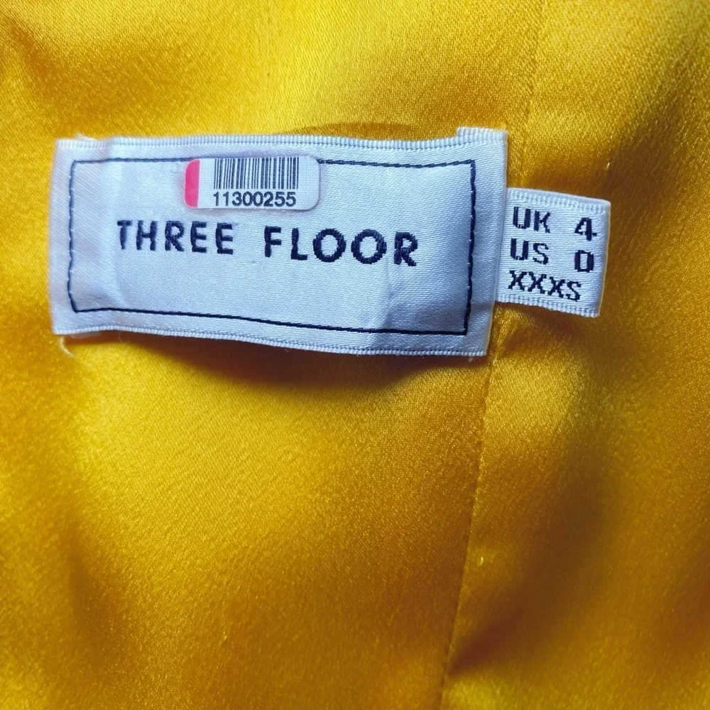 Three Floor Lemonana Dress Yellow Aqua Print
Ruffle Flutter Sleeve Midi - Picture 7 of 16